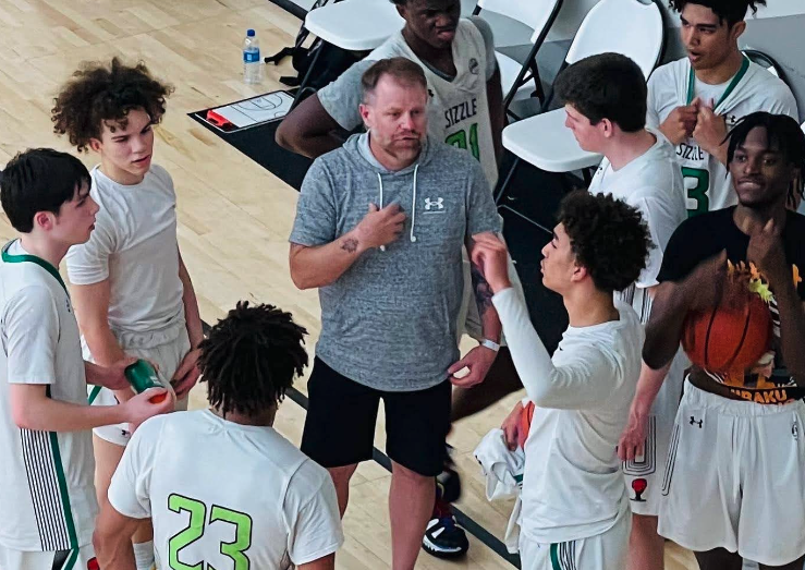 Coach D in the huddle with Grassroots Sizzle 17u